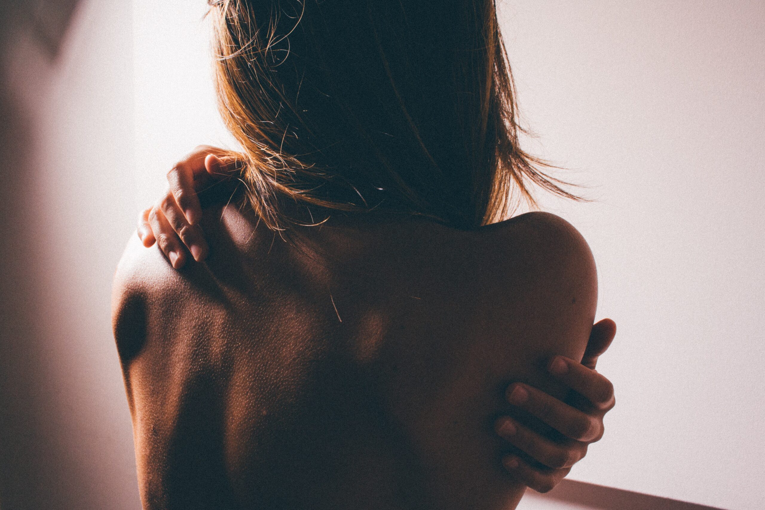 The Connection Between Back Pain and Large Breasts - Macleod Trail